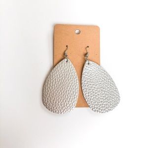 Silver leather earrings. Never worn